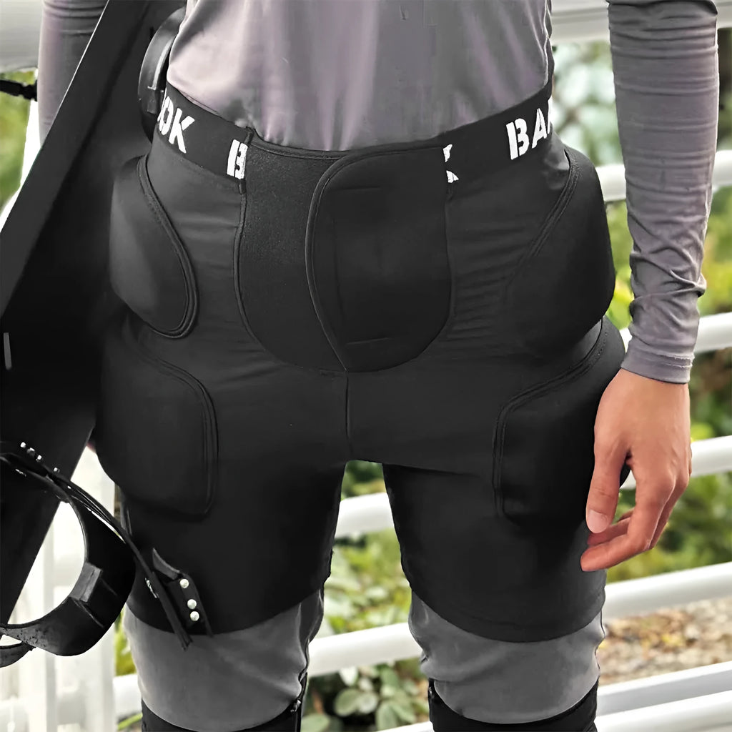 Black protective hip pad made of spandex and NBR foam for skating and skiing safety.