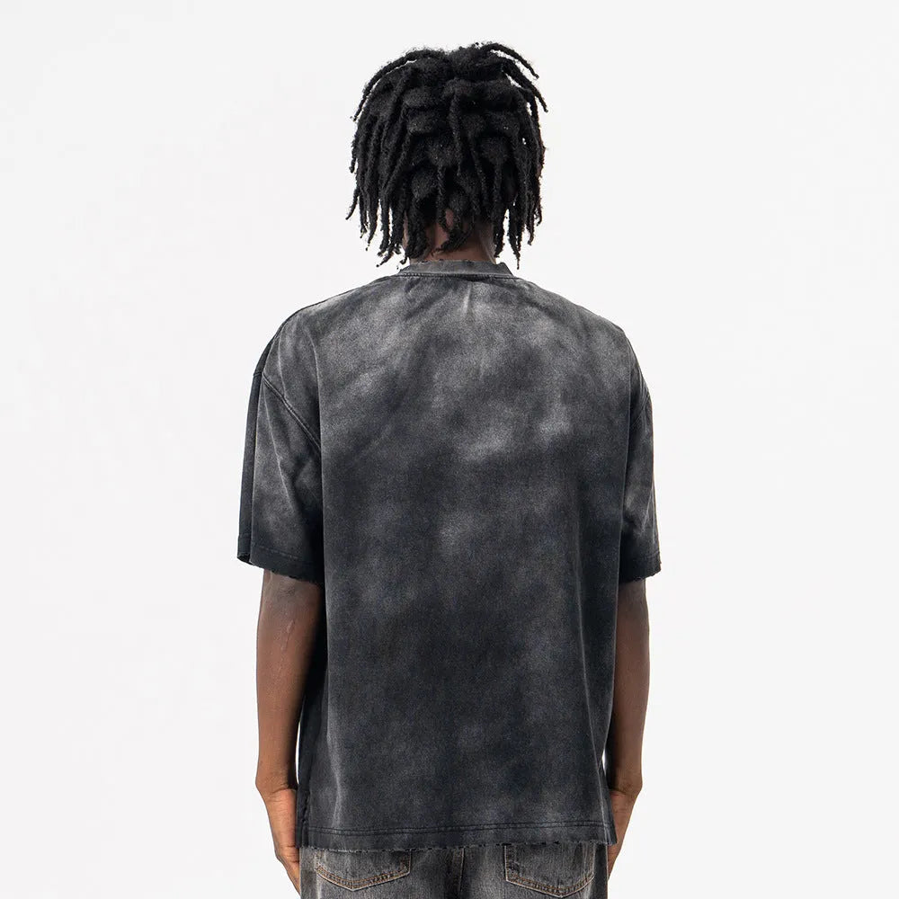 Men's black cotton T-shirt with white printed letter graphic design and drop shoulder sleeves