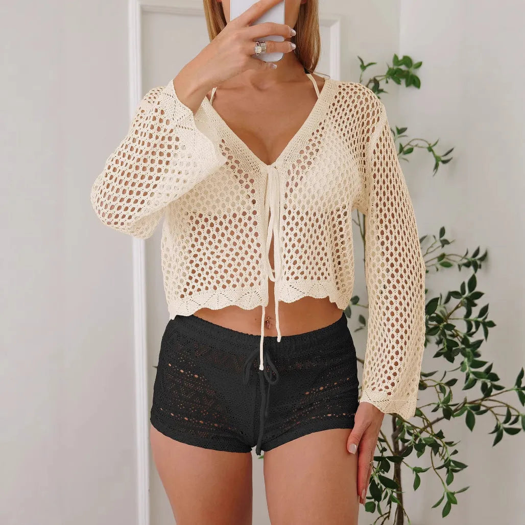 Women's apricot hollow woven cardigan blouse with bell sleeves, shown front view.