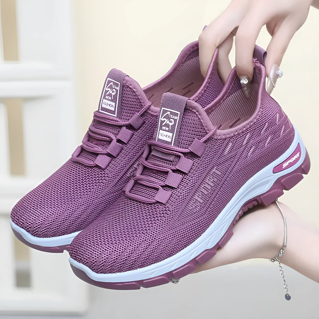 Men's and women's low-top casual sneakers with round toe and soft PVC sole in multiple colours.