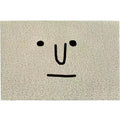 Square PVC floor mat with cartoon facial expression and geometric pattern in Mr Big Nose colour
