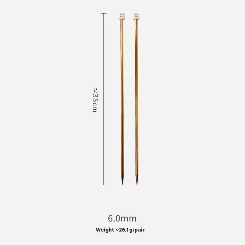 Set of long-handle metal crochet hooks with protective end caps arranged by size