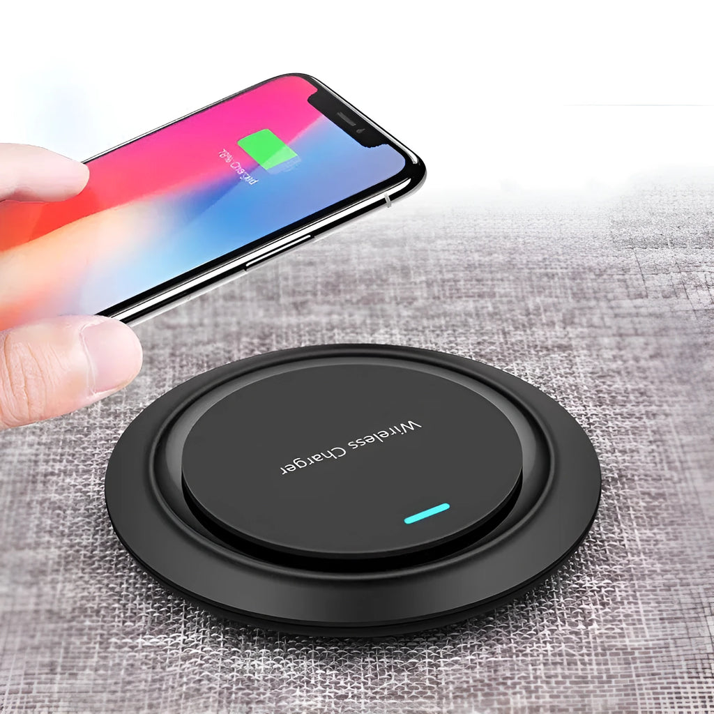 Round white desktop wireless charger with USB cable showing 10W fast charging for mobile phones