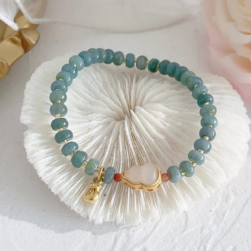 Gourd peace buckle jade bead bracelet for women in four colour options including Hetian jade and strawberry quartz