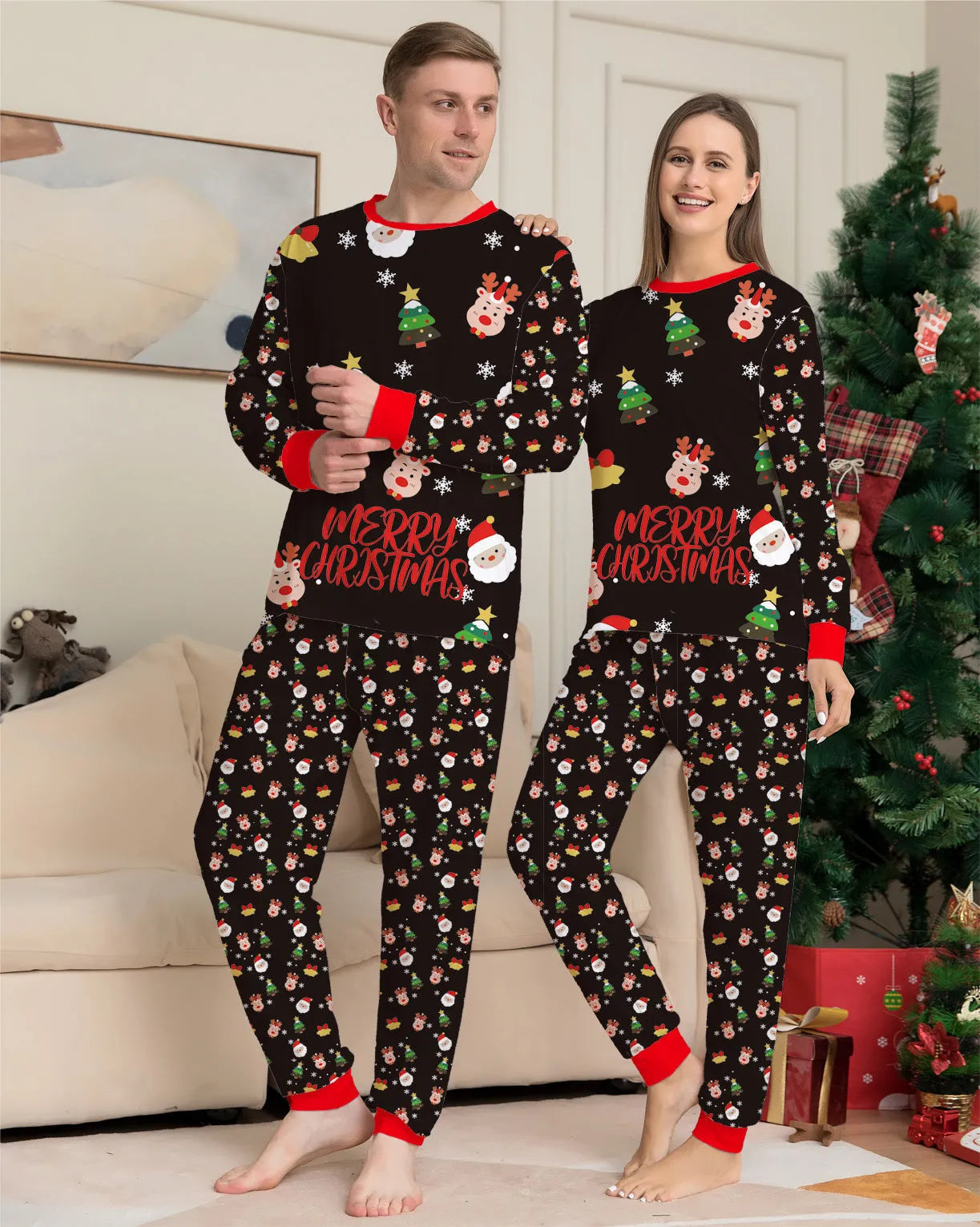 Family wearing matching red plaid Christmas pyjamas with dog in coordinating pyjamas