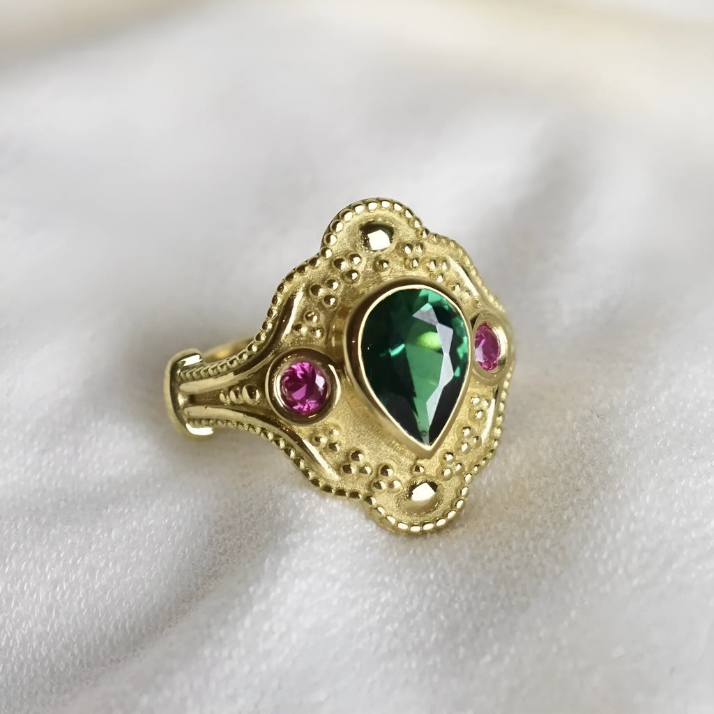 Gold geometric women's ring on display showing alloy construction with electroplated finish