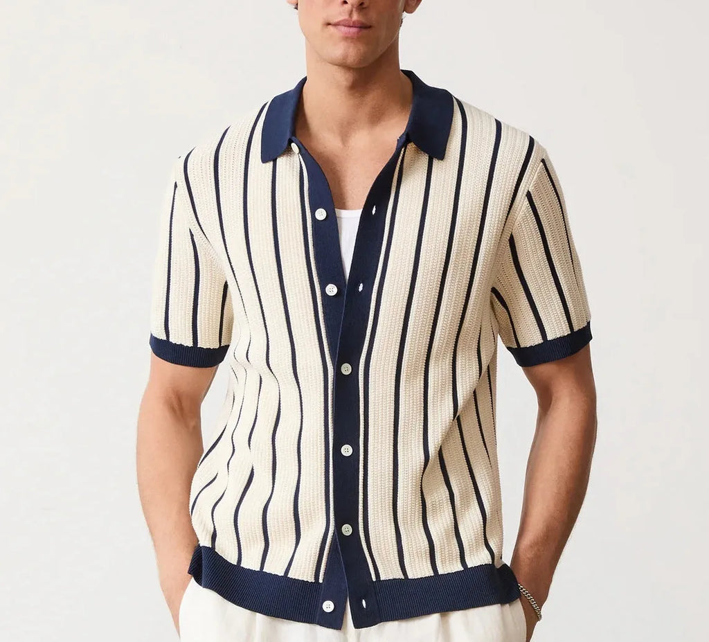 Men's white asymmetric short sleeve knitted top with a lapel collar on a model.
