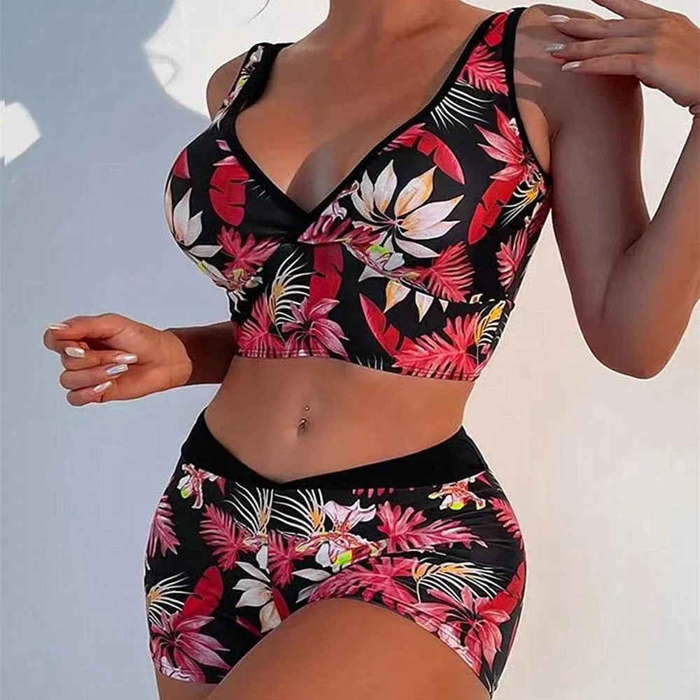 Women's two-piece swimsuit with printed boxer brief bottom and sleeveless top in multiple colour options