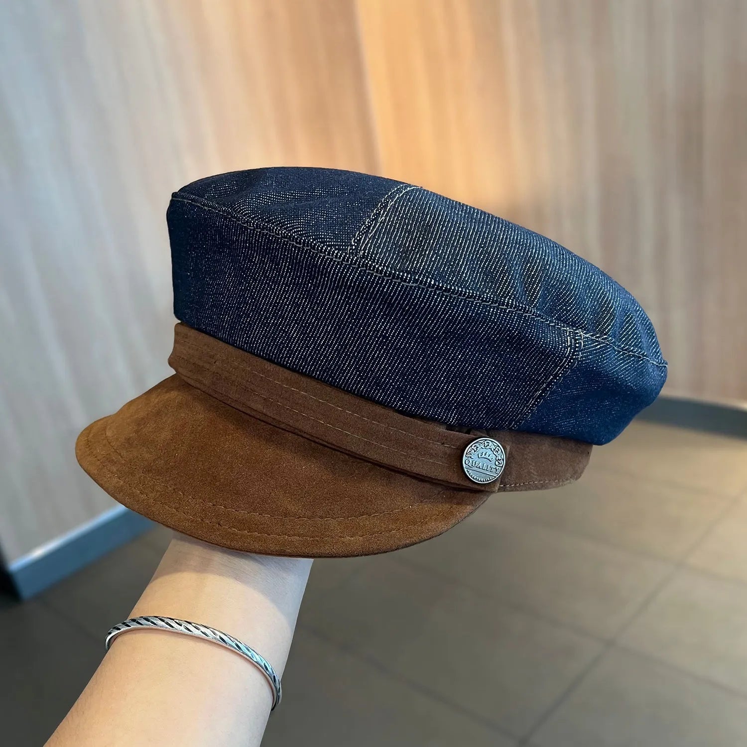 Dark blue denim octagonal newsboy hat with adjustable sizing for 54-58cm head circumference