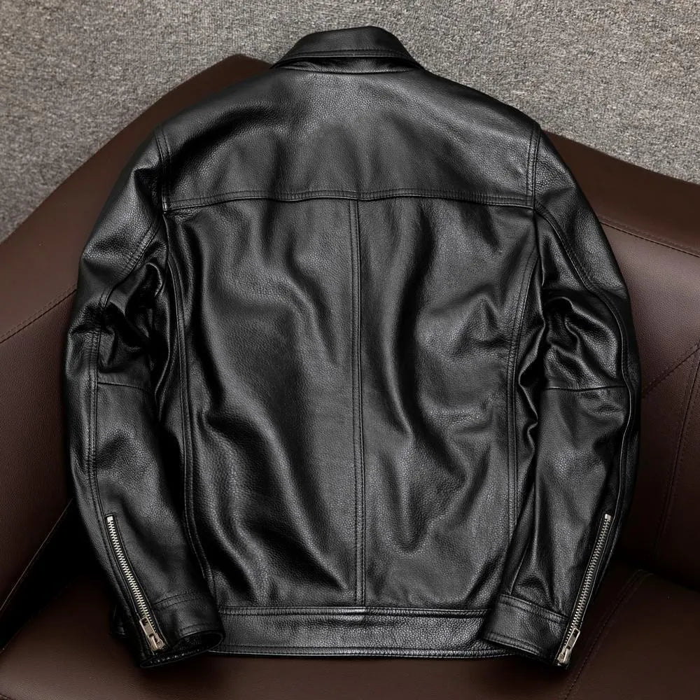 Men's black plus size loose fit PU leather jacket with lapel collar and side pockets.