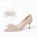 Women's champagne sequin stiletto heel pumps with low top design for wedding occasions