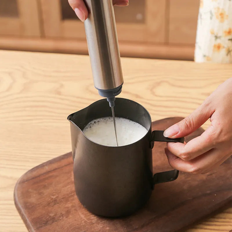 Portable electric foam maker in dark grey with 304 stainless steel whisk and ABS plastic body, dimensions 23cm x 12.5cm x 4.5cm