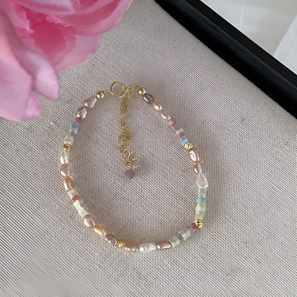 Women's 14K gilded purple silver bracelet with irregular natural pearls and matching necklace.