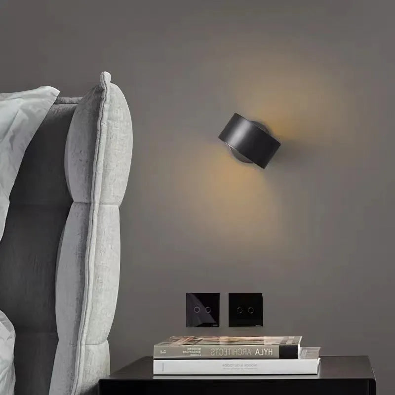Modern simple style copper wall lamp in a choice of black or gold finish.
