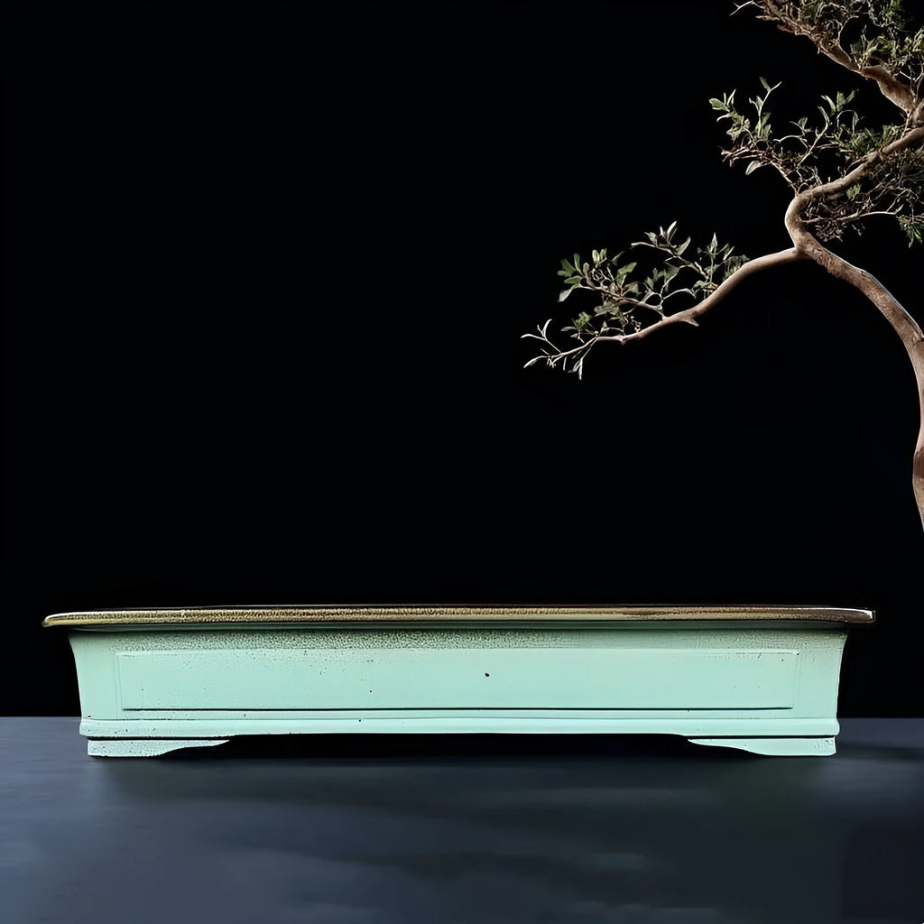 Green handmade ceramic bonsai flower pot with a retro crackled glaze finish.