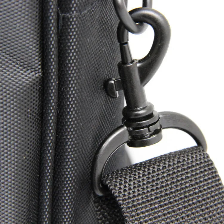 Black one-shoulder nylon computer bag with water repellent finish and hidden non-slip strap for 14-inch laptops