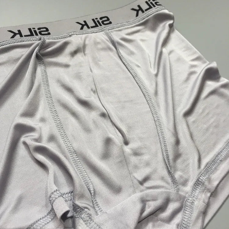 Men's navy blue silk shorts with loose fit and mid waist design