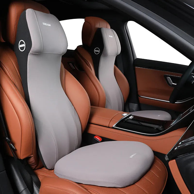 Automotive memory foam waist cushion and headrest support pillow in integrated one-piece design