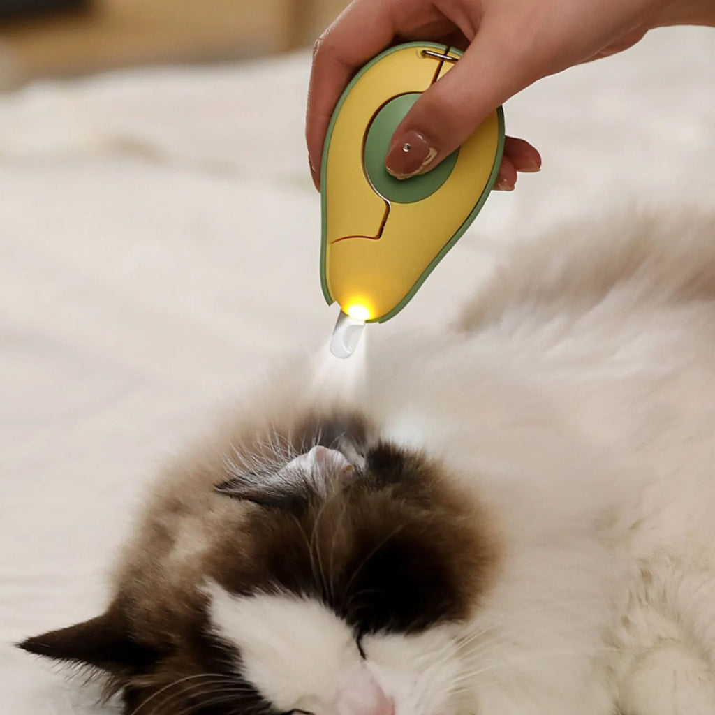 Professional pet nail clipper with LED light on, in green, pink, and white colour options for small dogs and cats.
