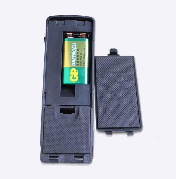 Black wedge door stop alarm with 120 dB siren, vibration sensor and stainless steel cover, for hinged doors