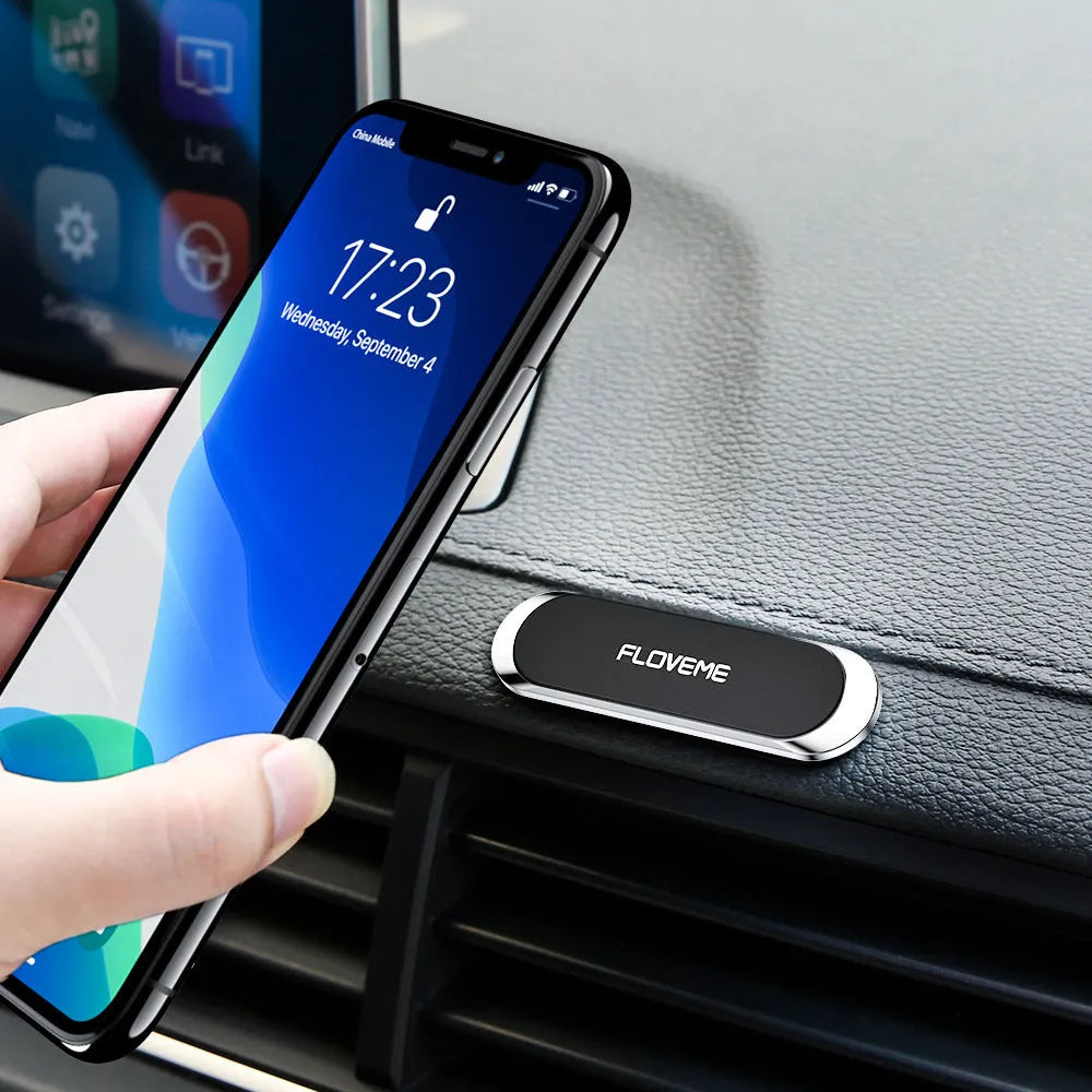 Black magnetic car phone holder with square silver iron sheet and adhesive foam mount