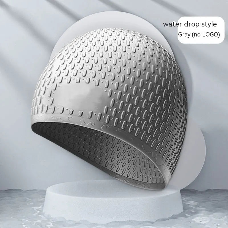 A solid colour silicone swimming cap for adults, shown in one of nine available colour options.