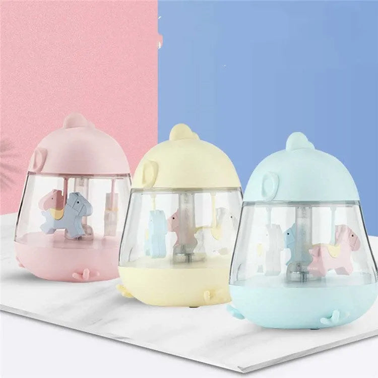 USB carousel music light with rotating trojan, music box, and warm yellow light on a desk.