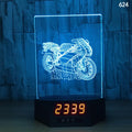3D glowing dolphin LED table lamp with wireless charging base and remote control on a desk.
