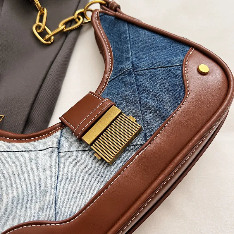 Brown denim women's bucket shoulder bag with diamond chain straps and lock detail