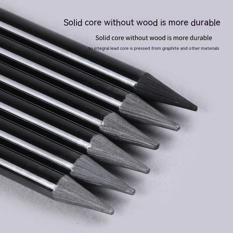 Set of nine wooden drawing pencils on a suction card, containing three carbonised and six graphite solid core pencils for artists.