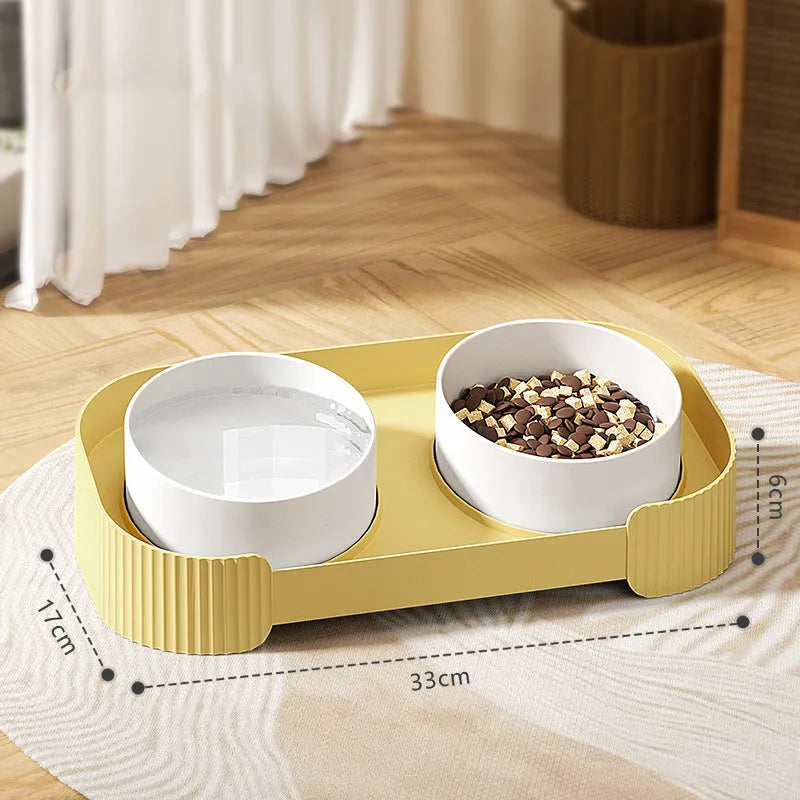Green ceramic raised cat bowl set with tilted stand and non-slip base for food and water