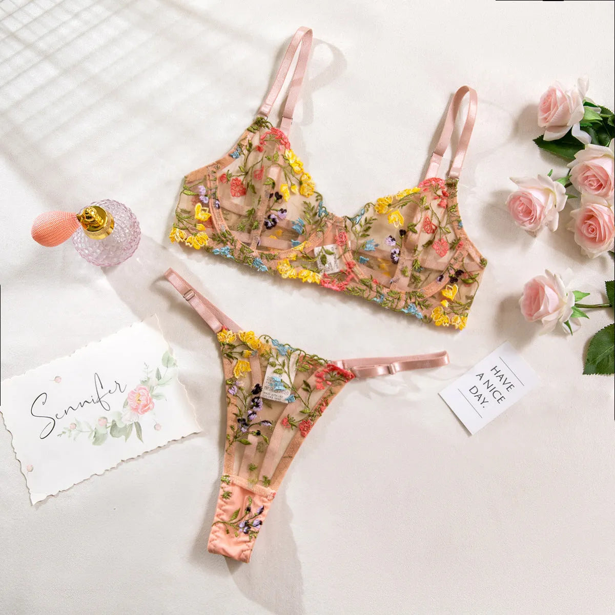 Floral mesh bra with steel ring T-back design in skin colour showing 3/4 cup construction