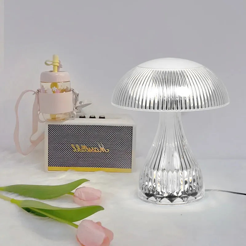 Small white night lamp with USB charging cable and touch control on wooden table