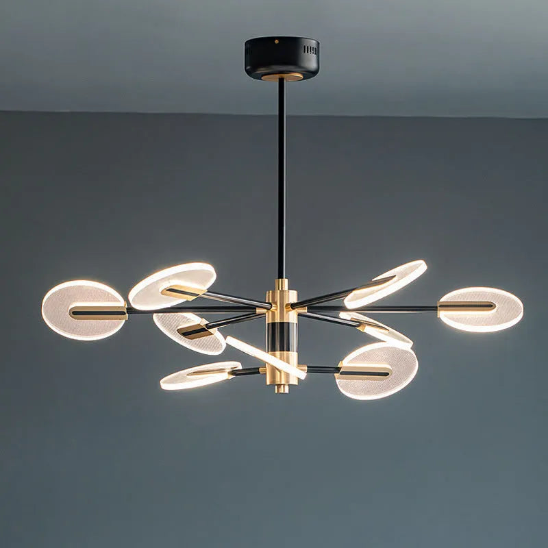 Nordic style LED chandelier with black iron frame and white acrylic shades, shown in a dining room setting.