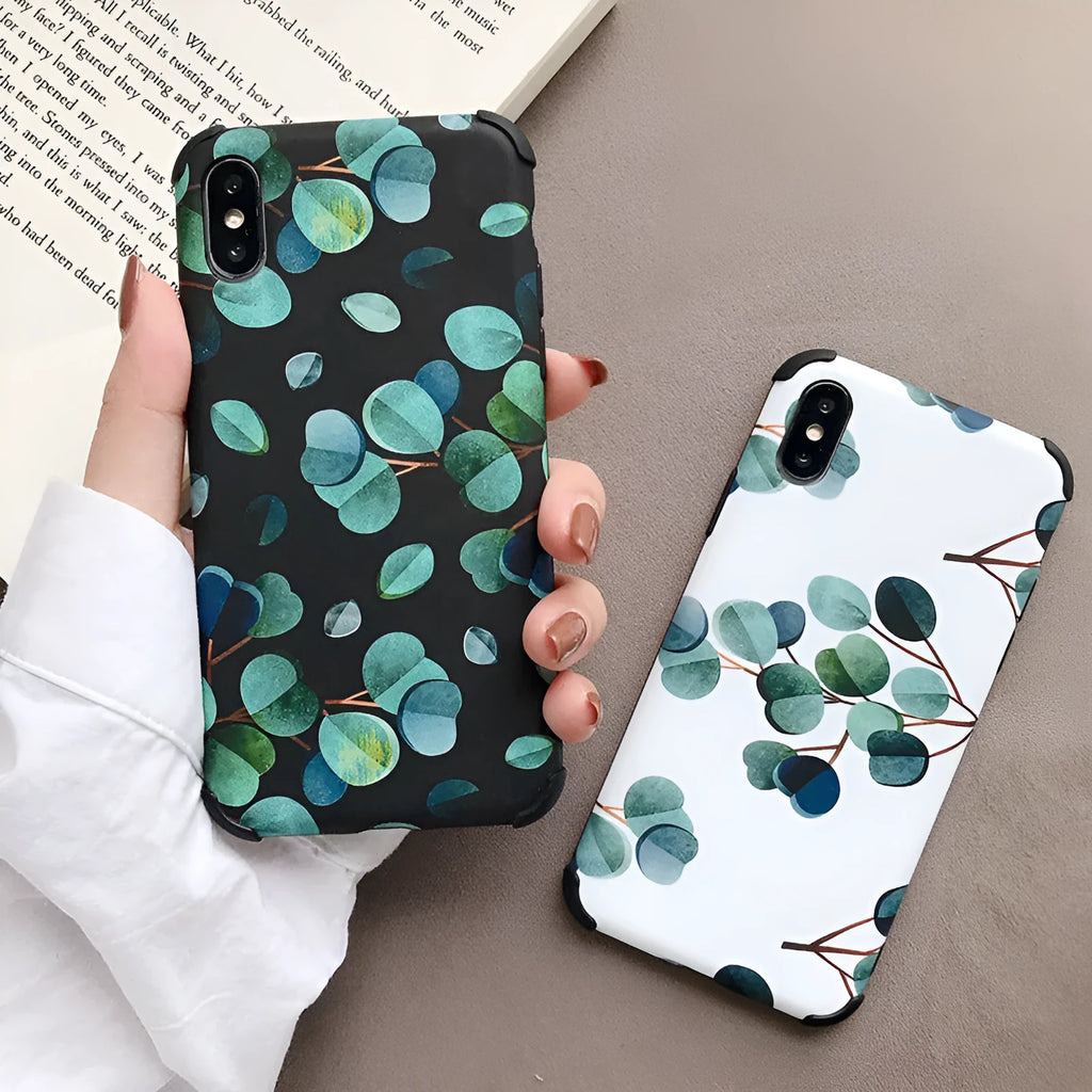 Black silicone iPhone case with leaf pattern design showing front and back views