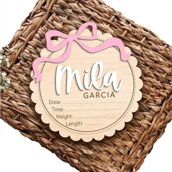 Square wooden baby room ornament personalised with a child's name in two available sizes.
