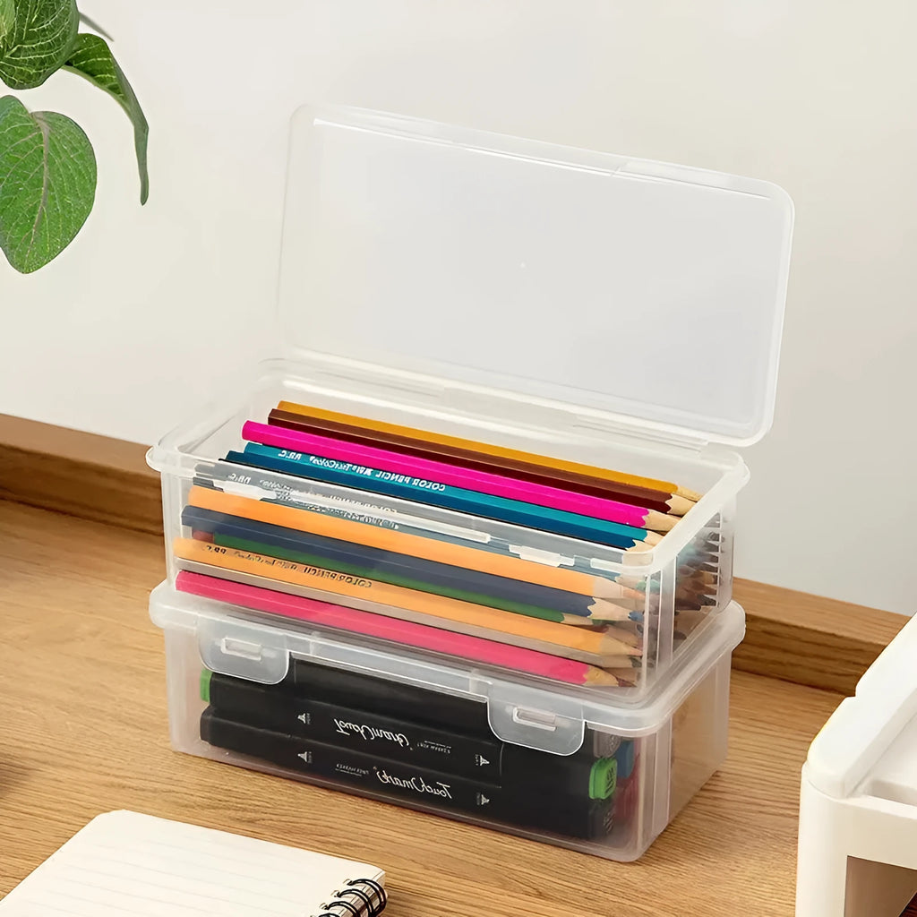 Transparent plastic pencil storage box for organising pens and drawing tools