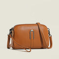 Genuine cowhide leather women's shoulder bag with horizontal square shape in dark green colour.