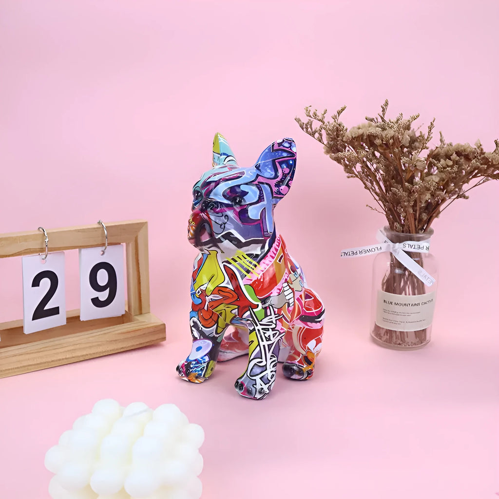 Modern simple resin bulldog statue in graffiti colour on a shelf