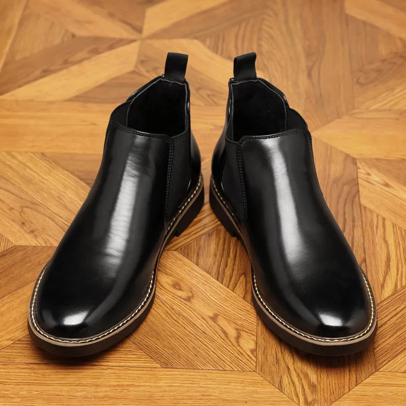 Men's black formal leather pointed-toe boots with a square heel on a white background.