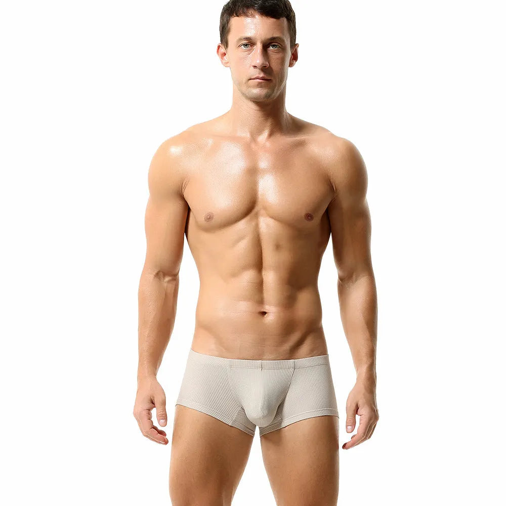 Men's low waist nylon boxers in solid colours including orange red and cloudy blue