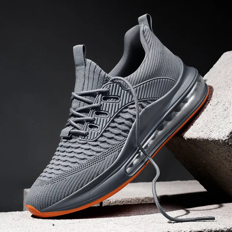 Men's black low-top mesh running shoe with lace-up front and rubber sole.