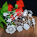 Silver carbon steel cutting die with plant design pattern measuring 14.3 by 9.9 cm