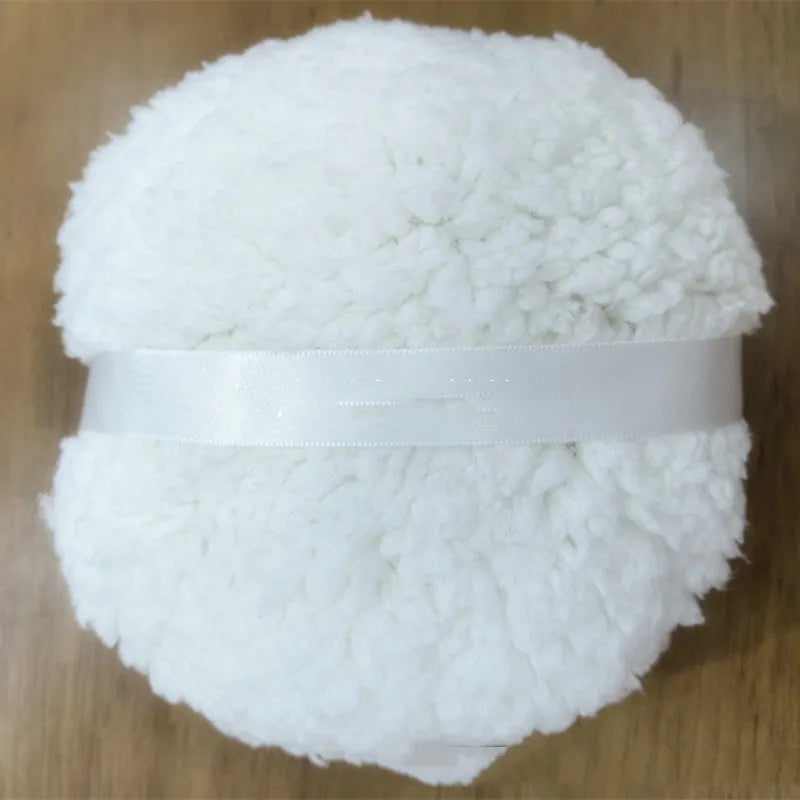 Oversized rectangular plush powder puff for makeup application measuring 150x75mm