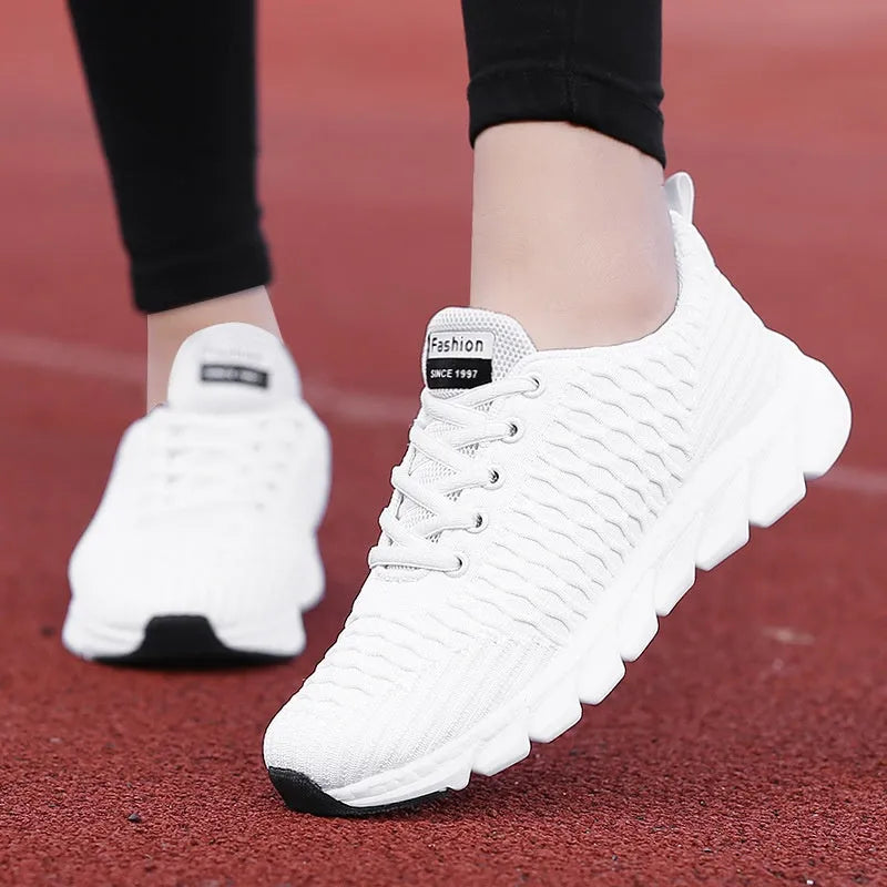 Women's running shoes with fly weaving upper in black, pink, and white colour options