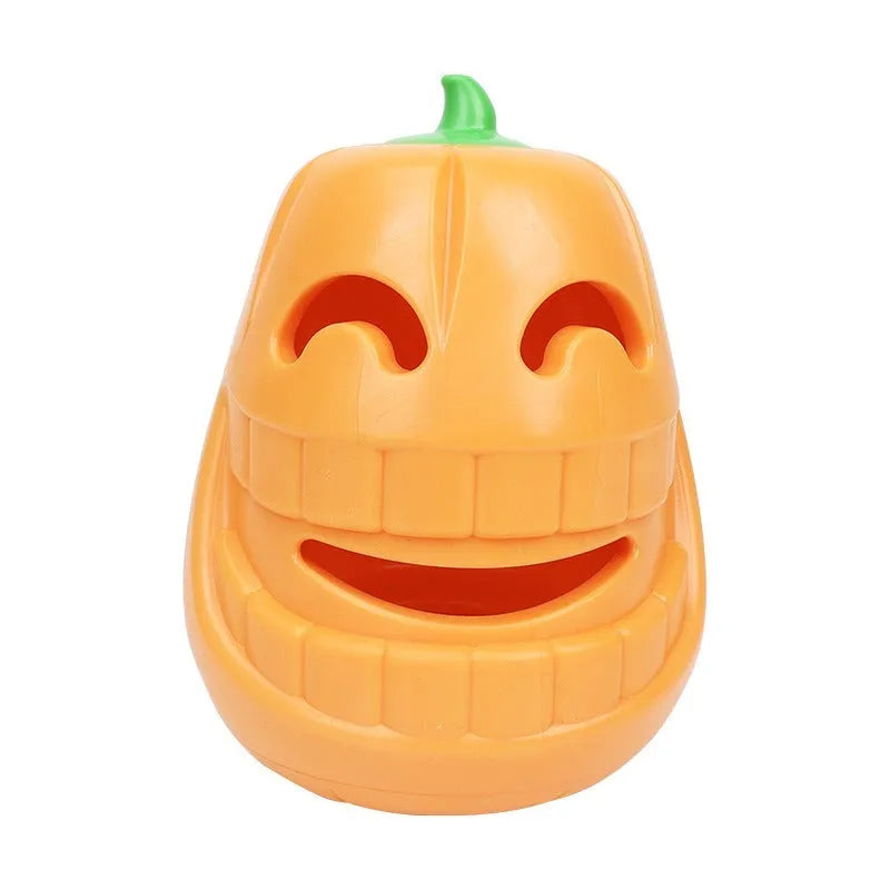 Red and orange Halloween pumpkin shaped interactive dog chew toy on a white background.
