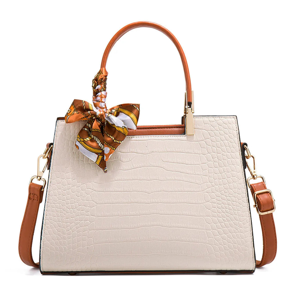 Milky white women's PU leather handbag with horizontal square shape and multiple interior compartments