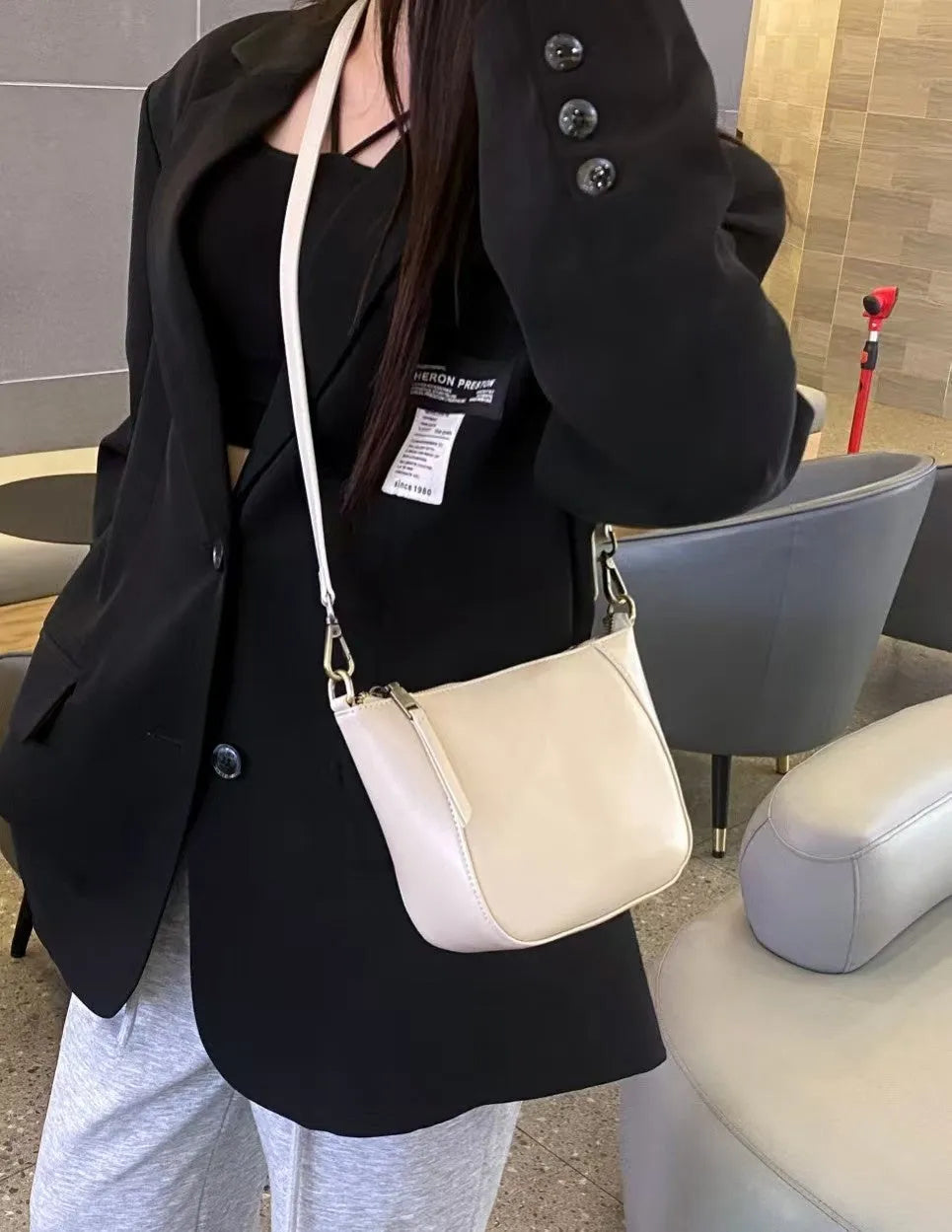 Ladies' top-grain leather handbag in vertical square shape with single strap, 18cm tall, in milk apricot colour