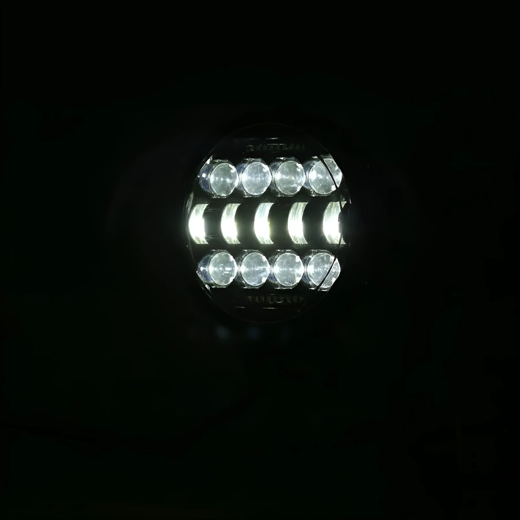 7-inch circular black LED headlight with spot beam, die-cast aluminium housing, IP67 waterproof rating for off-road vehicles