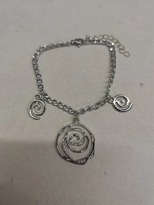 Women's spiral donut jewellery set with necklace, bracelet and earrings in gold or silver geometric design